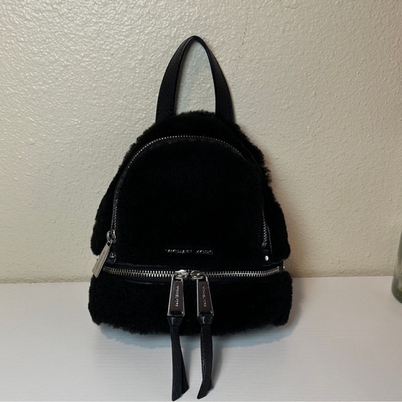 Michael Kors Rhea Zip Mini Shearling Backpack - Picture 2 of 14